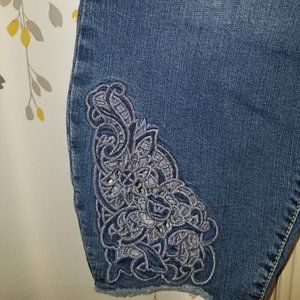 Torrid Cropped jeans with scrolls and flower cut out,  Size 24